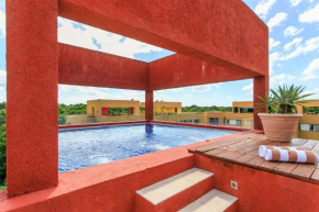 Colorful PH with private rooftop & pool in Playacar!